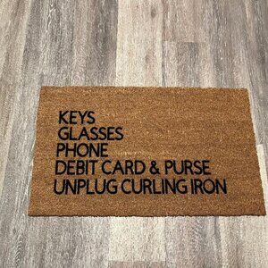 Keys, eyeglasses, phone, debit card & purse, unplug curling iron coir doormat